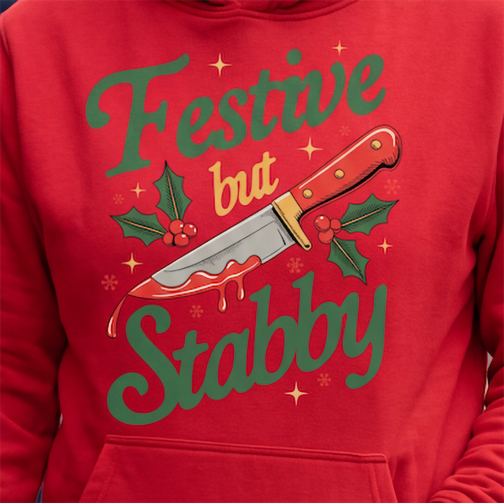 Close-up of red Christmas hoodie with Festive But Stabby knife design