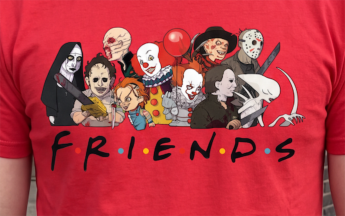 Close-up of red Horror Friends Halloween shirt featuring classic horror characters