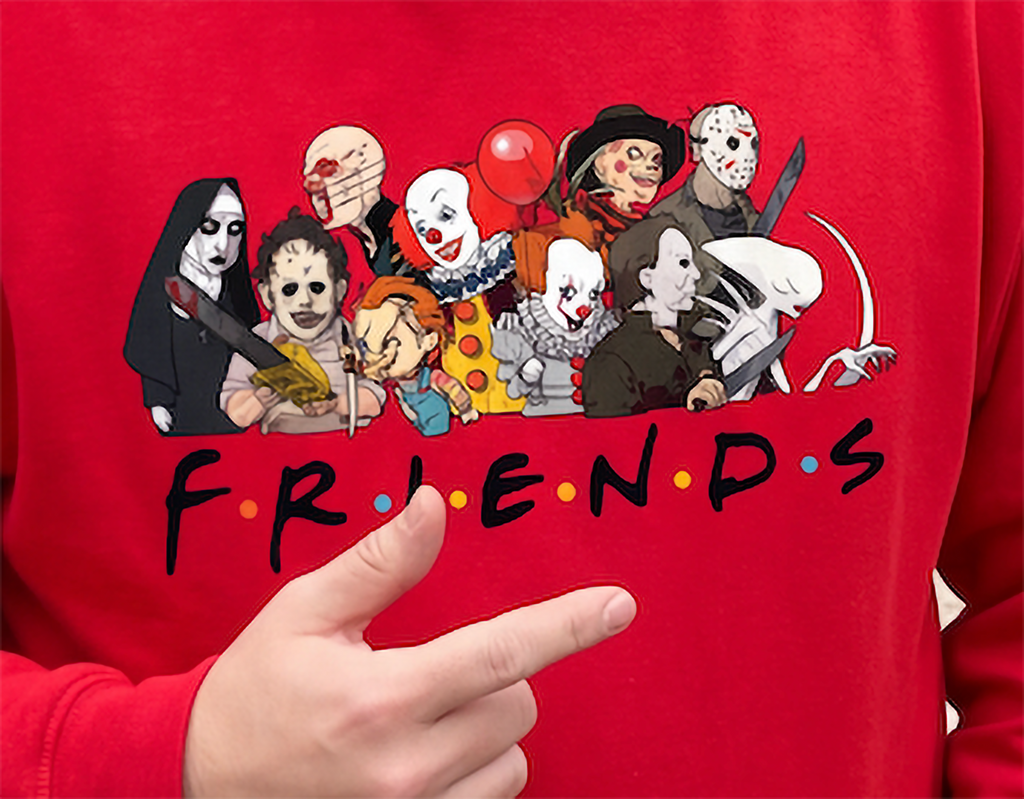 Close-up of red Horror Friends Halloween hoodie featuring scary movie characters