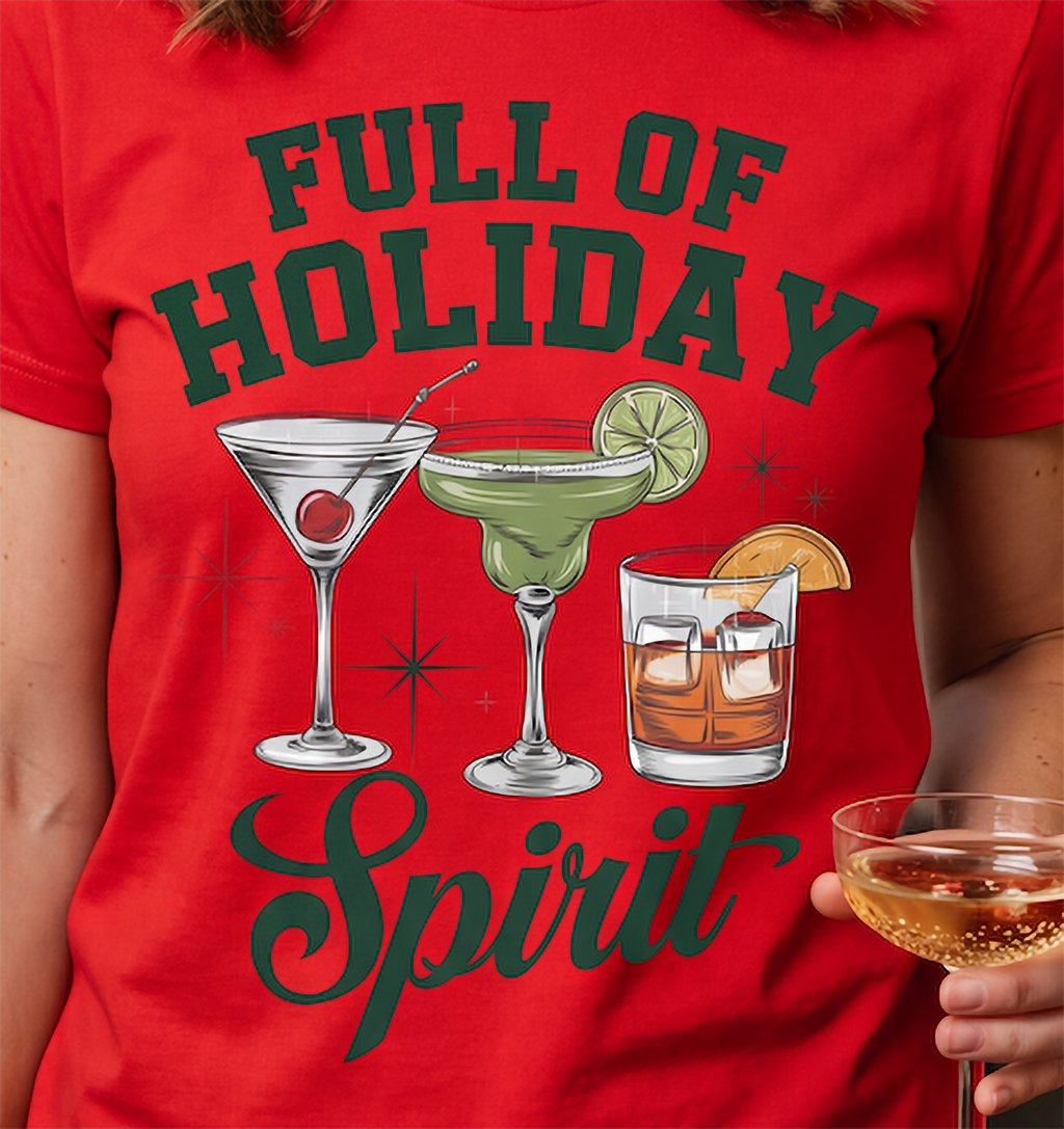 Close-up of Full of Holiday Spirit Christmas cocktail graphic on red shirt.