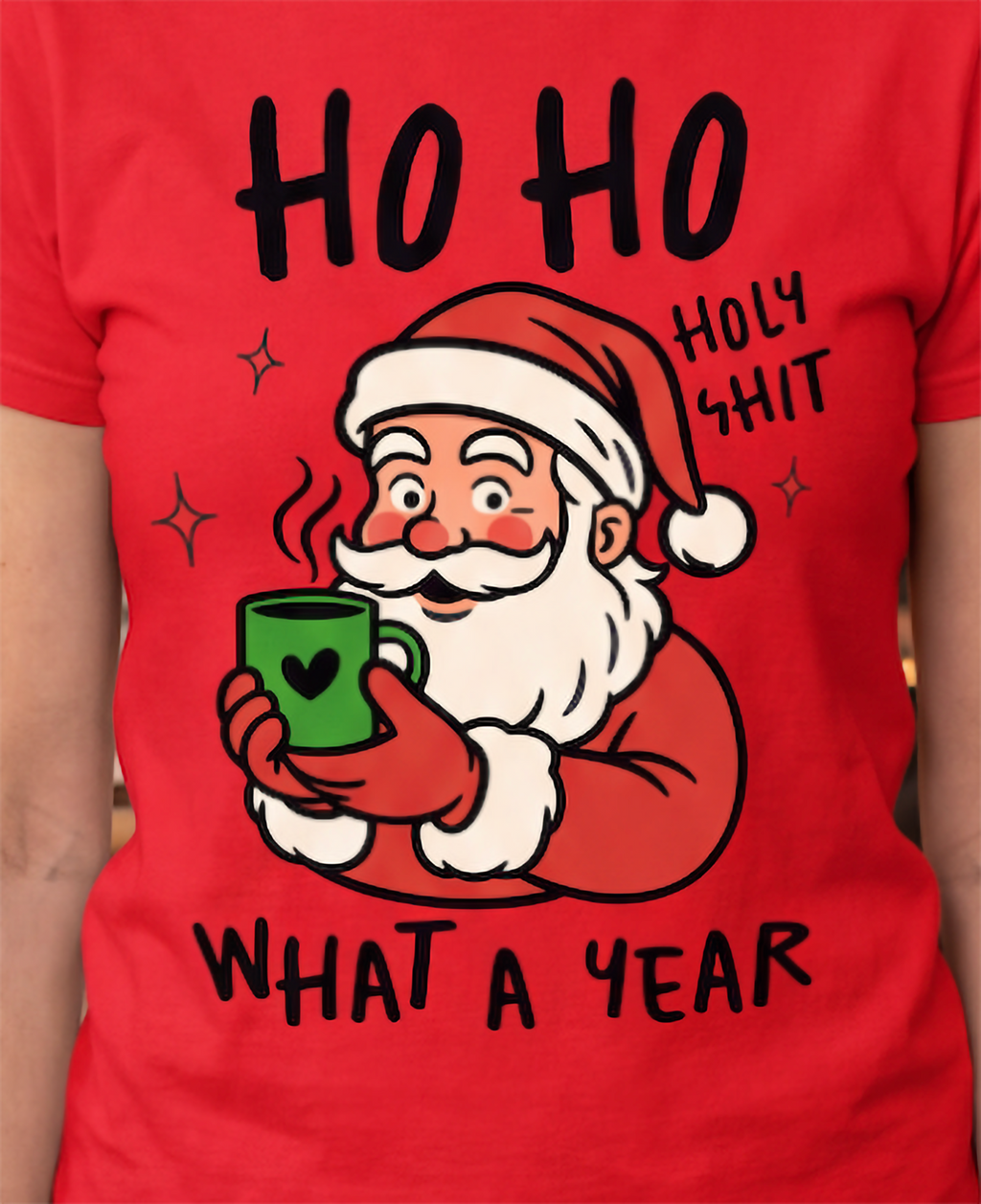 Close-up of Ho Ho Holy Shit What a Year Santa Christmas graphic printed on red shirt.