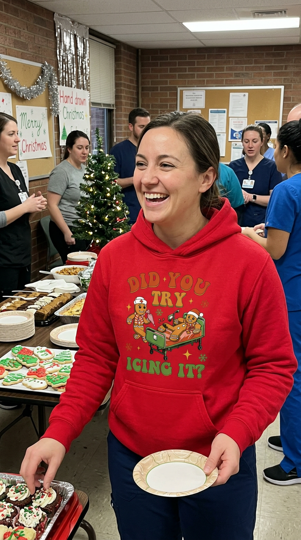 Woman wearing red Did You Try Icing It Christmas hoodie in a hospital setting