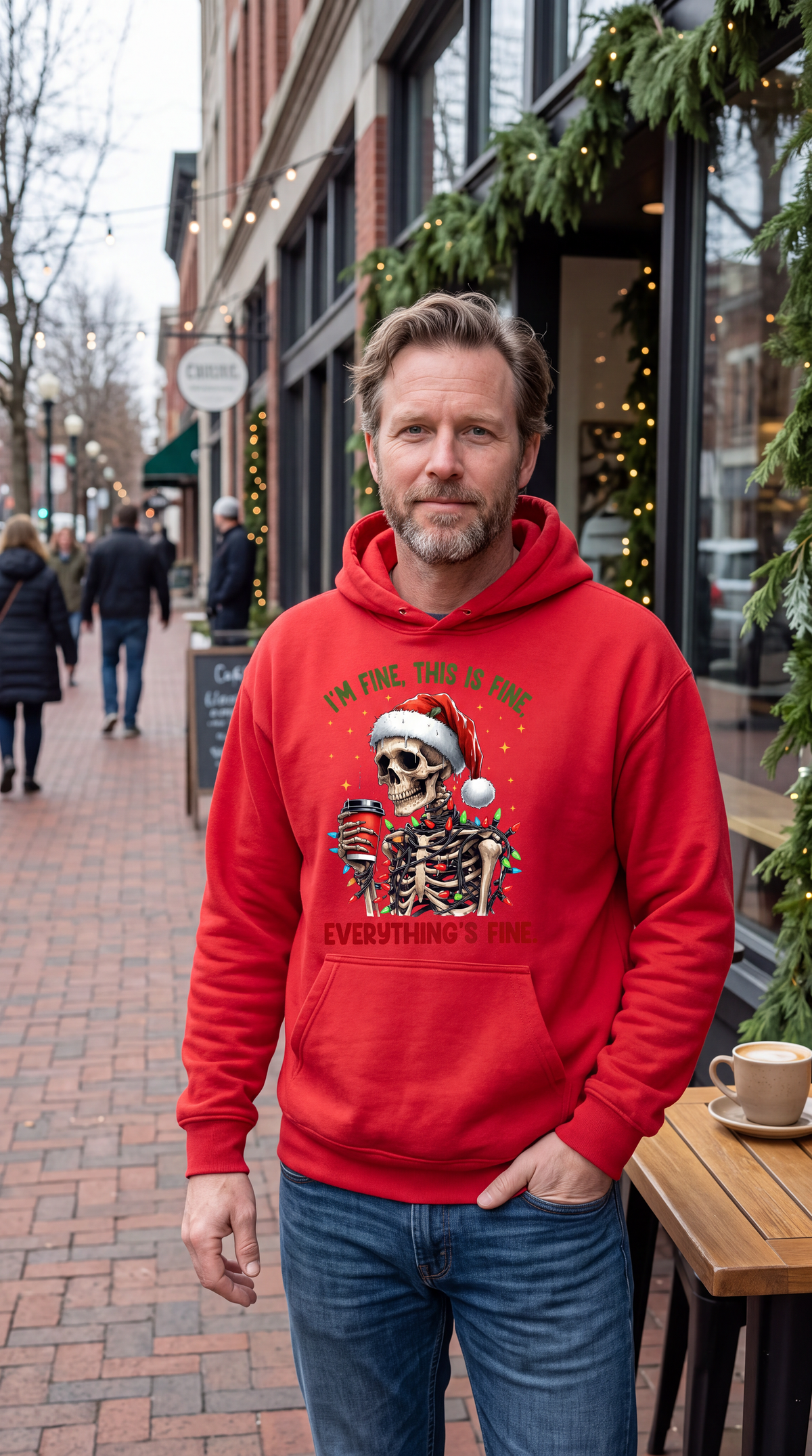 Man wearing red Christmas skeleton hoodie with I’m Fine Everything’s Fine design