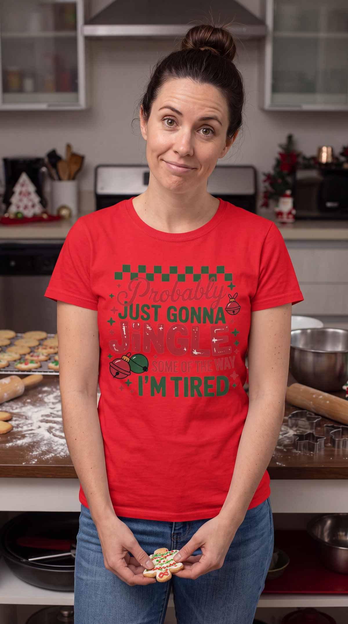 Woman wearing a red Probably Just Gonna Jingle Some of the Way Christmas graphic tee.