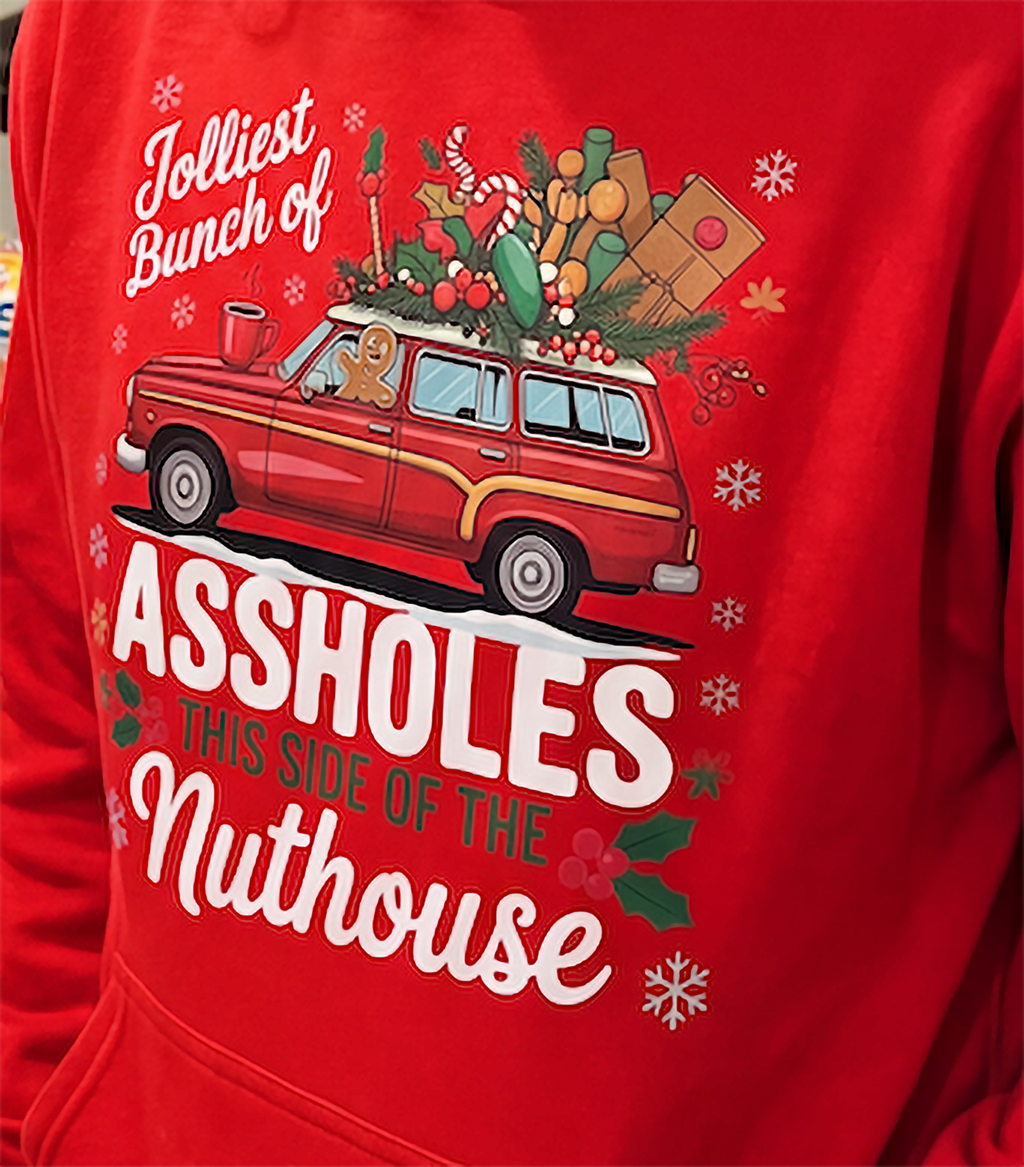 Close-up of red funny family Christmas hoodie with Jolliest Bunch of Assholes design
