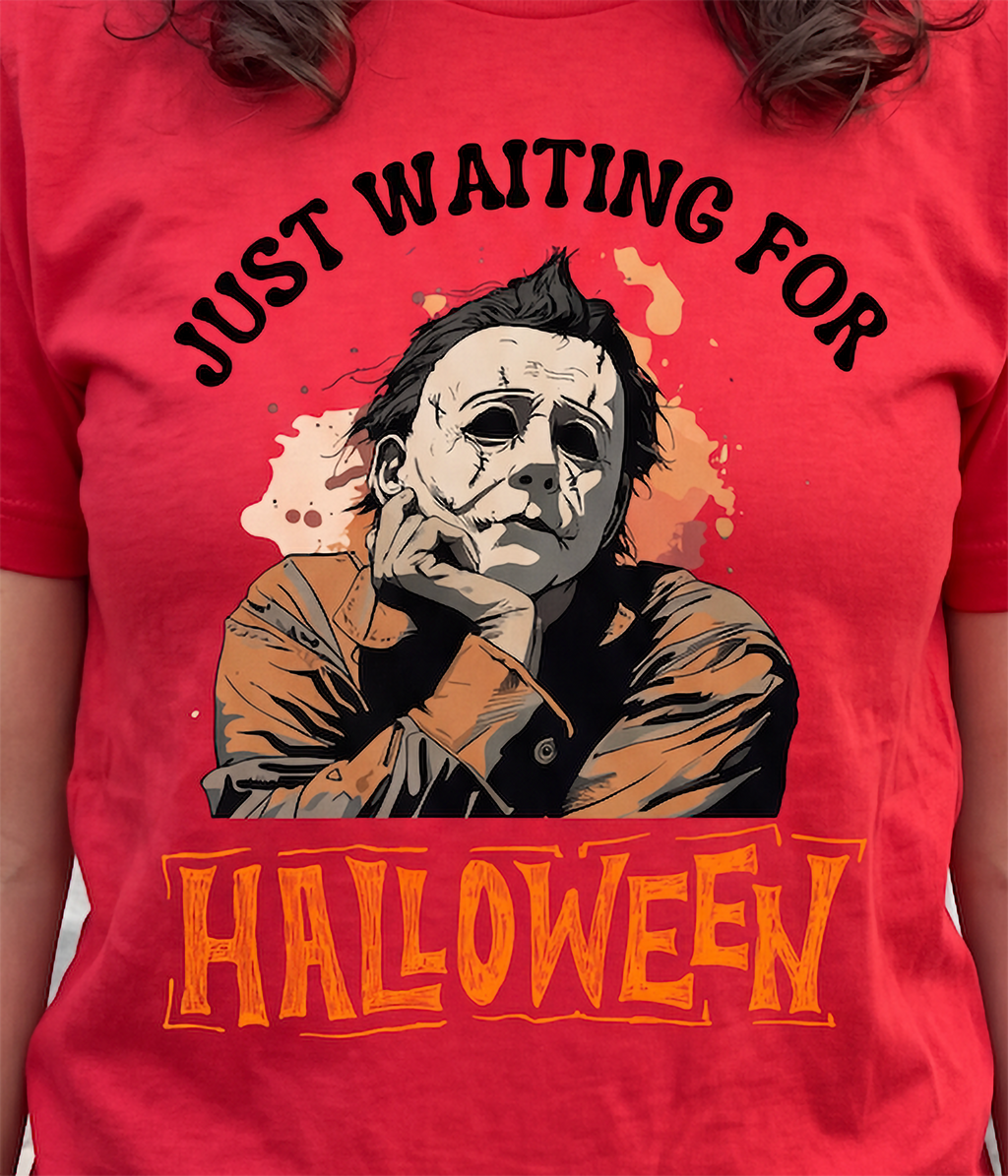 Close-up of red Michael Myers Halloween shirt with spooky horror design