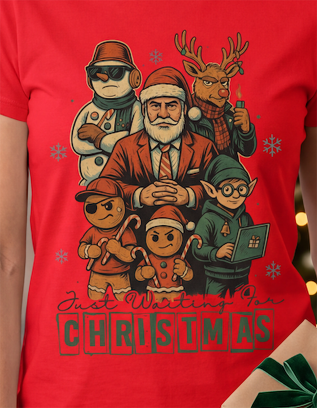 Close-up of red funny Christmas shirt with Santa, reindeer, elf, snowman and gingerbread holiday character design.