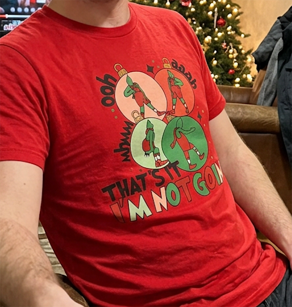 Red Close-Up: Close-up of the That's It I'm Not Going Christmas graphic printed on a bright red holiday shirt.