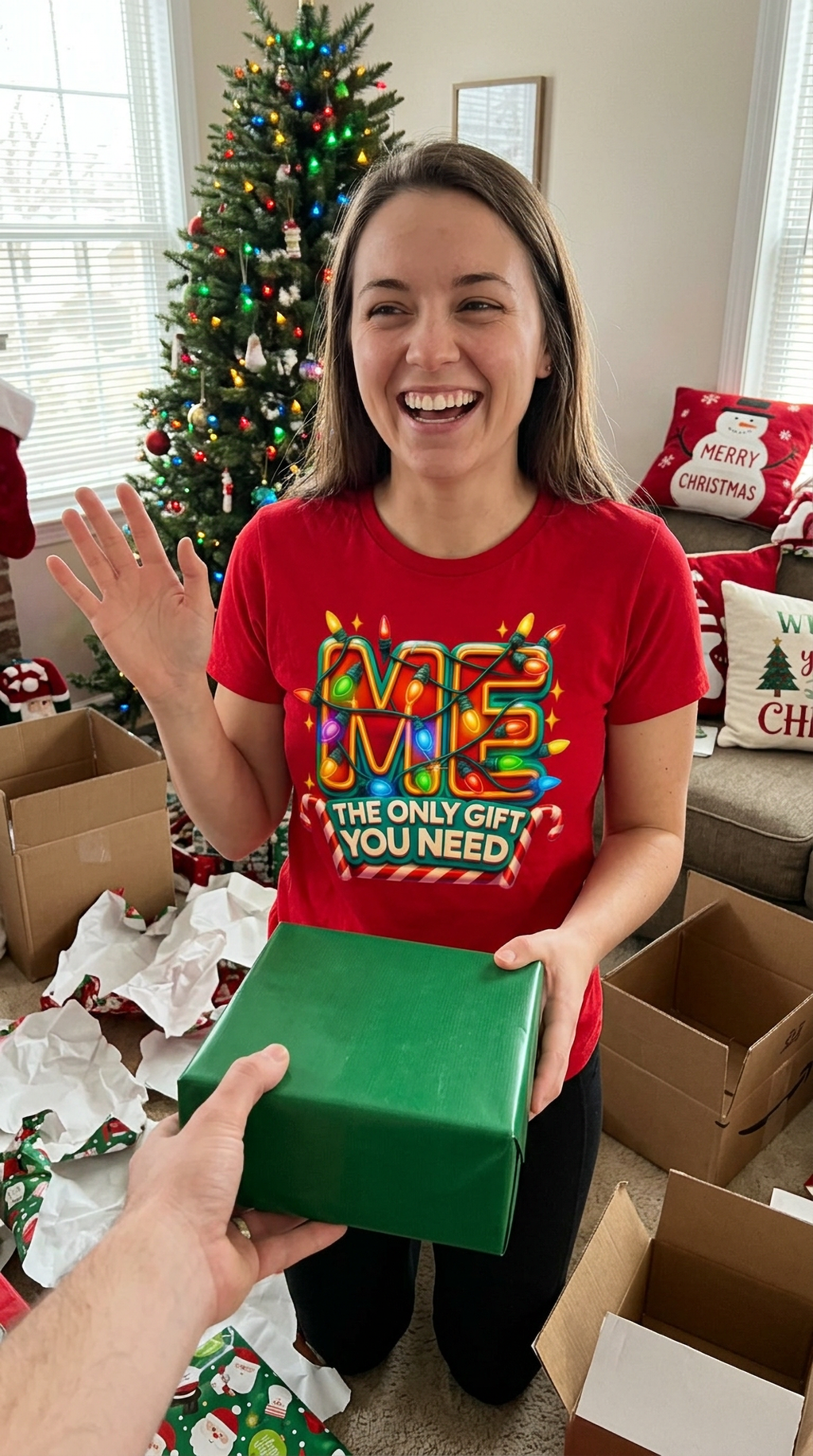Lifestyle – Red: Woman wearing a red funny Christmas graphic t-shirt featuring colorful holiday lettering during a festive Christmas celebration.