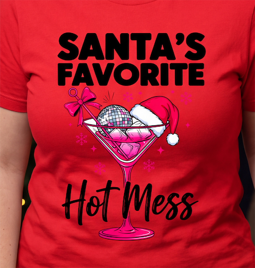 Close-up of Santa’s Favorite Hot Mess Christmas cocktail graphic on red shirt.