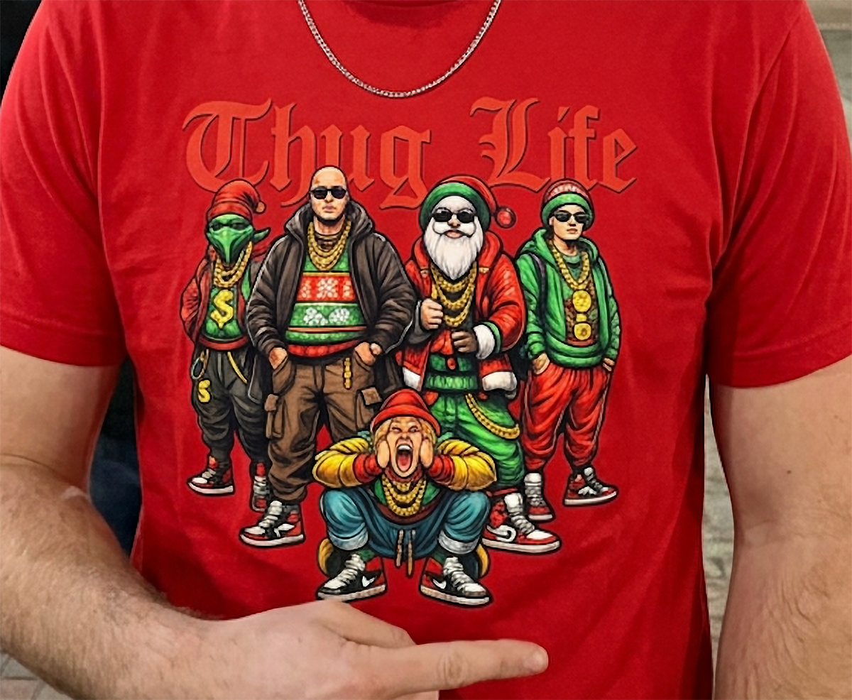 Close-up of red Thug Life Christmas graphic tee showing detailed holiday streetwear artwork