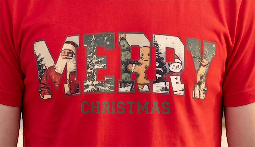 Close-up of red Vintage Merry Christmas shirt featuring the retro MERRY Christmas graphic