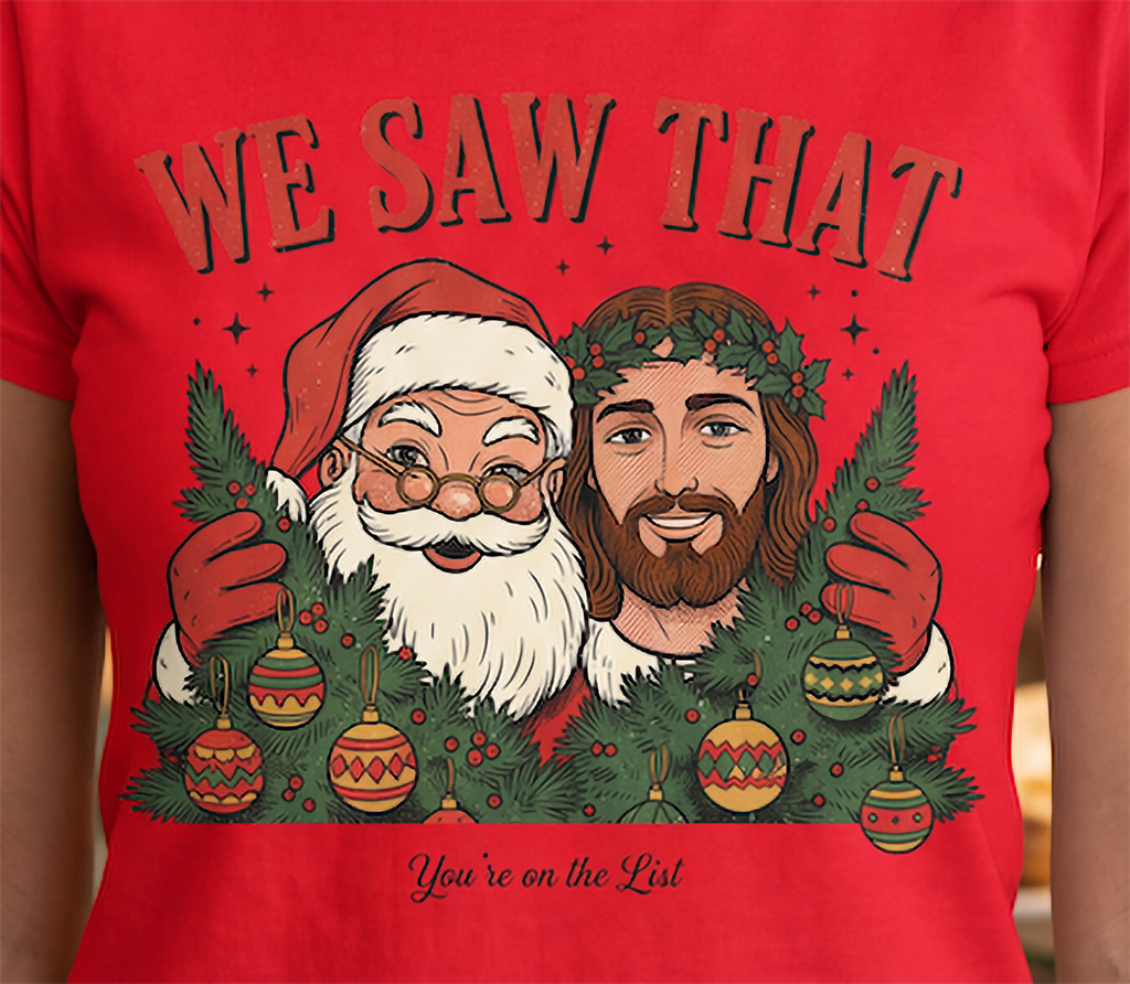 Close-up of Santa and Jesus We Saw That Christmas graphic on red shirt