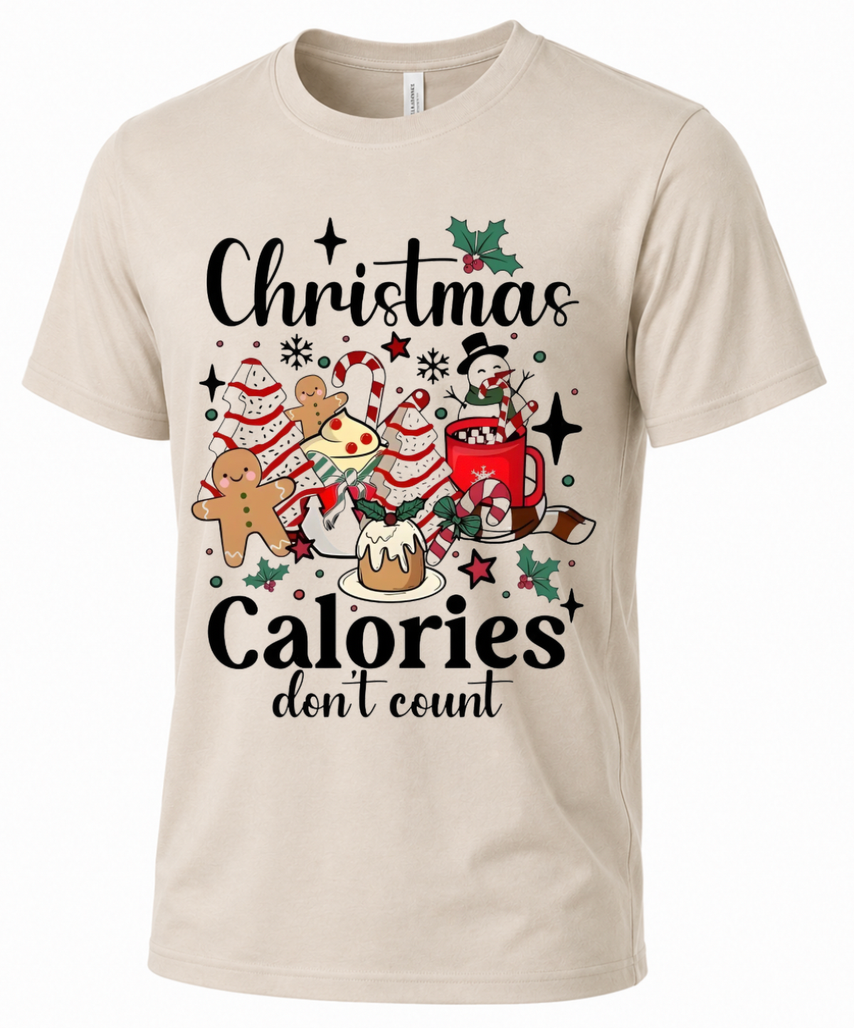 Sand Christmas Calories Don’t Count graphic tee featuring gingerbread, candy canes, cocoa and holiday sweets.