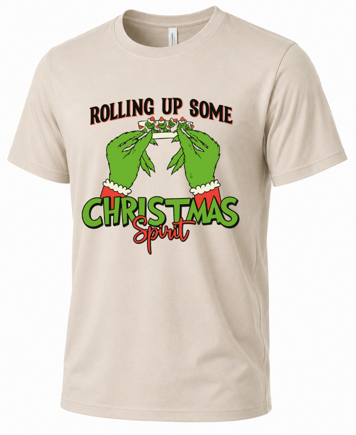 Sand-colored unisex Christmas graphic tee featuring green hands rolling a festive joint and Christmas Spirit slogan.