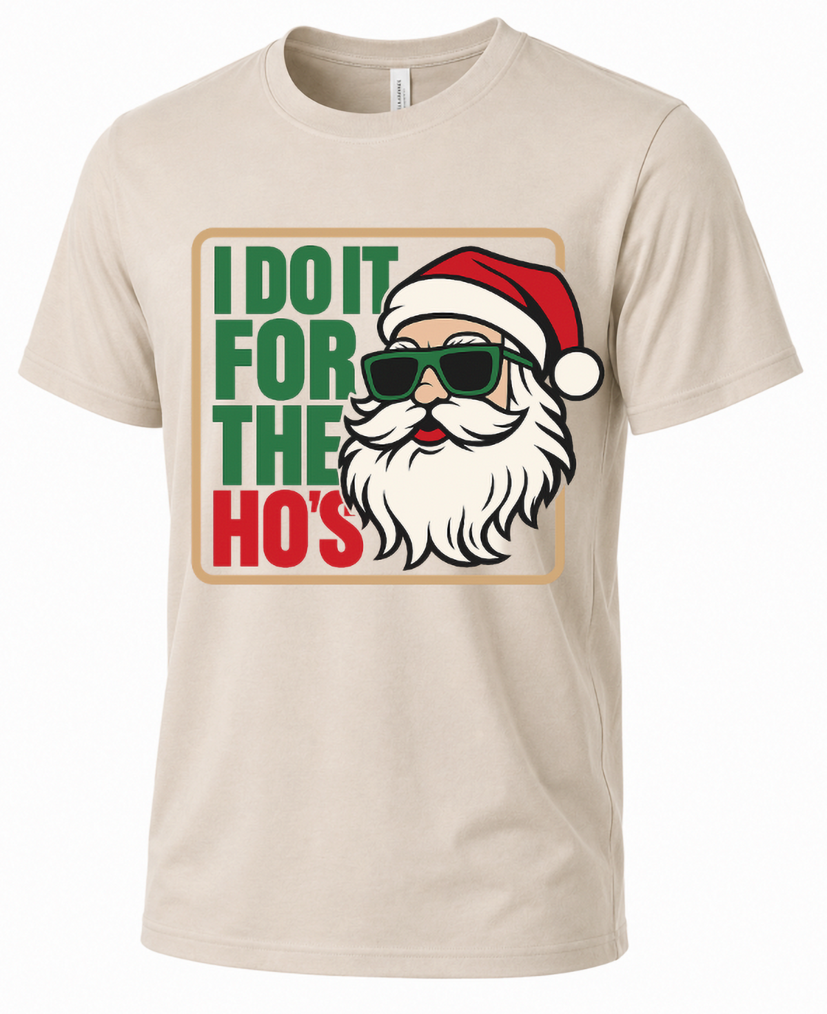 Sand-colored Christmas graphic tee featuring Santa Claus wearing sunglasses and humorous holiday lettering.