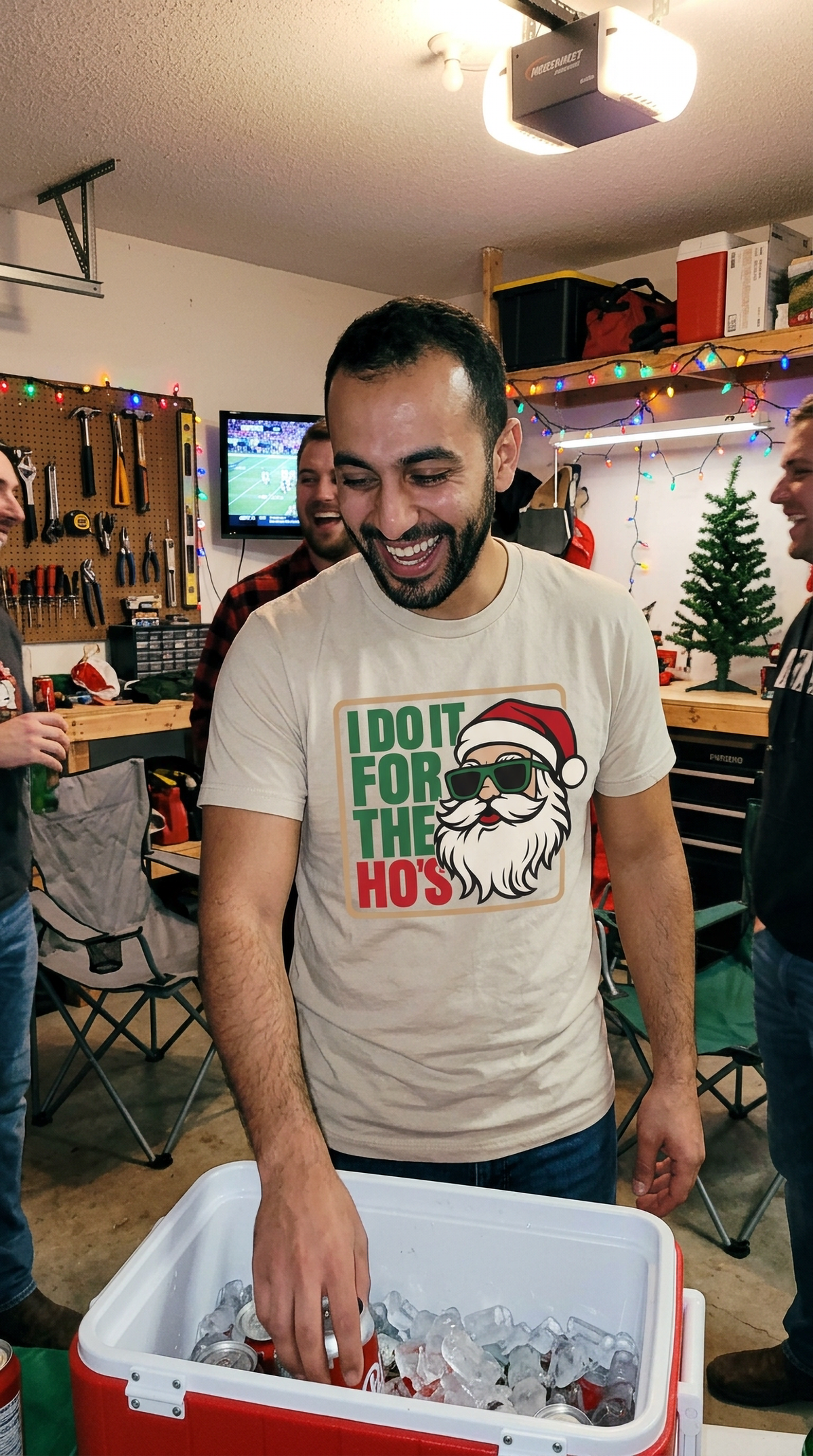 Man wearing a sand-colored funny Santa Christmas shirt at a casual holiday gathering.