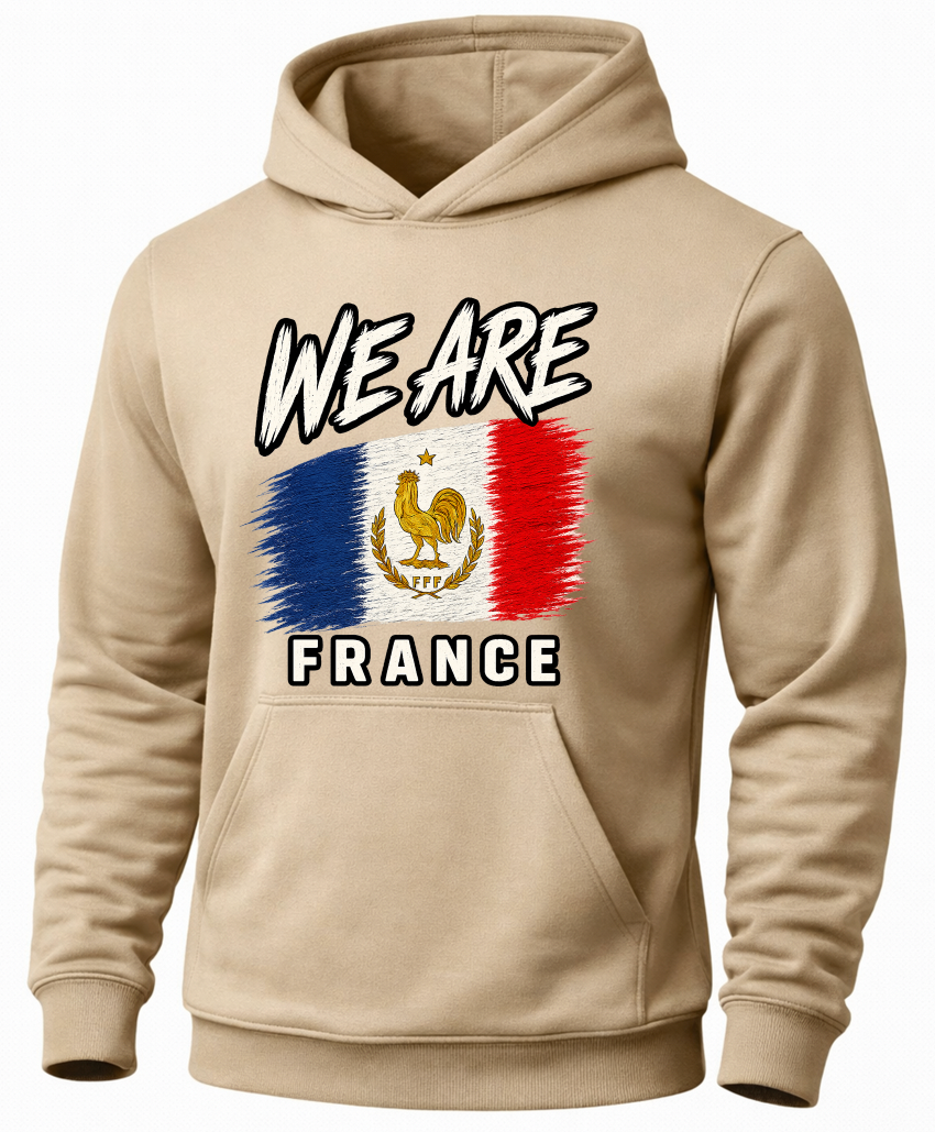 A beige pullover hoodie with a graphic print on the front featuring the French flag and the text 'WE ARE FRANCE' in white with black outlines.