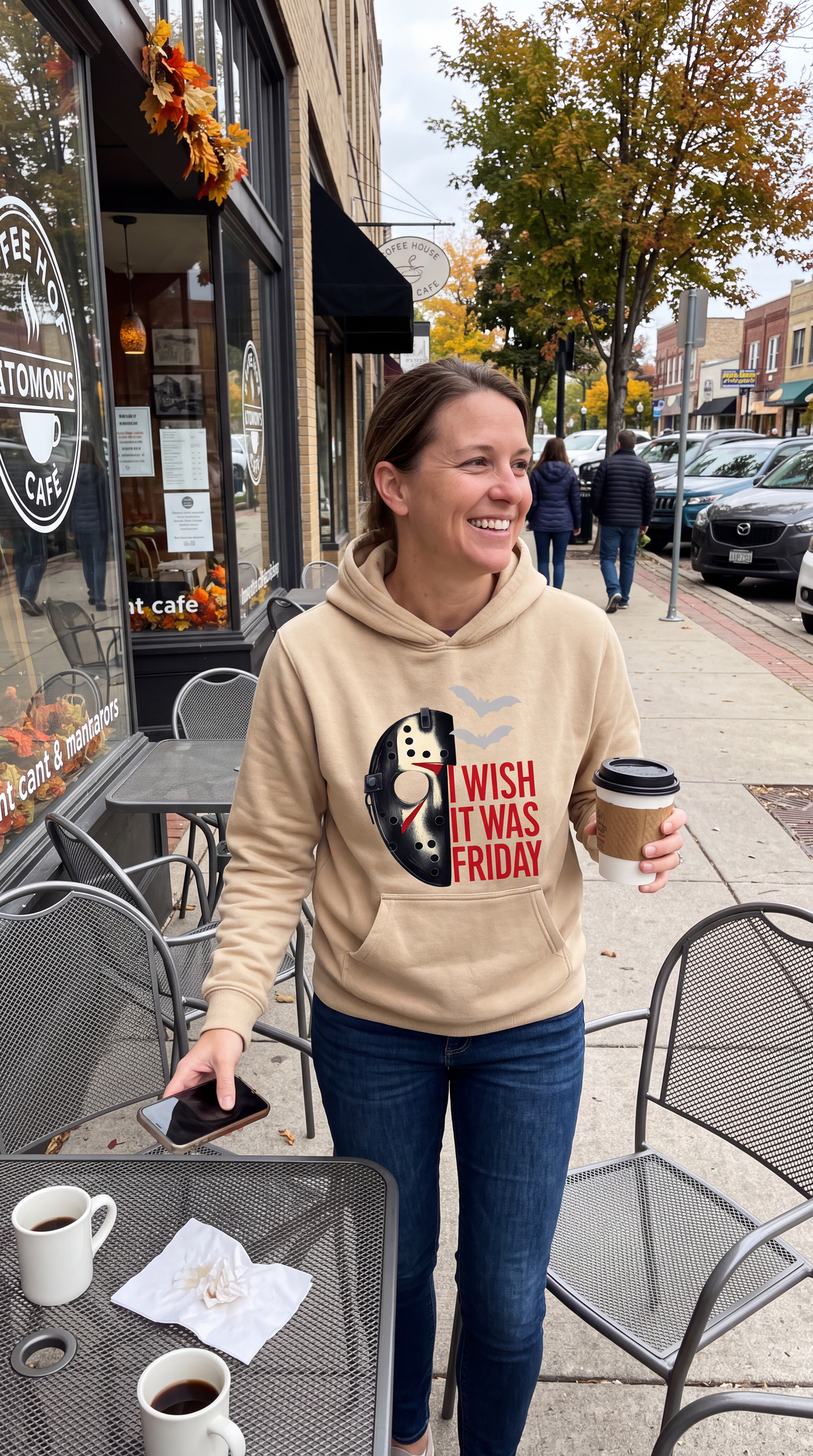 Woman wearing sand Friday the 13th Jason Voorhees horror hoodie