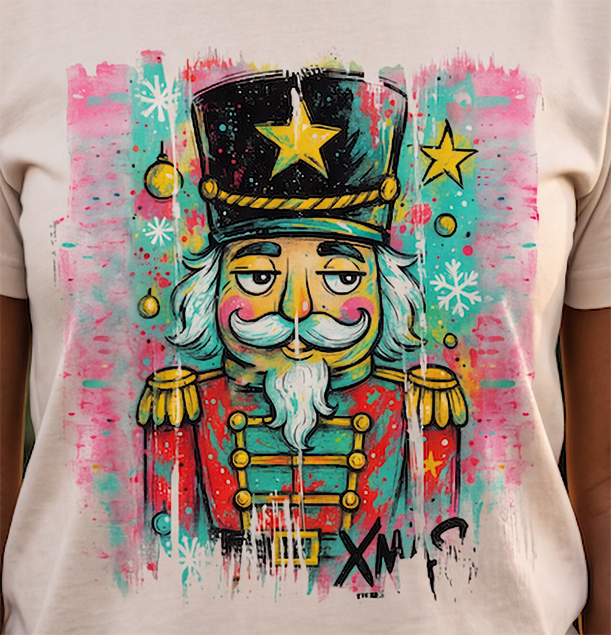 Close-up of colorful graffiti nutcracker artwork on sand Christmas shirt
