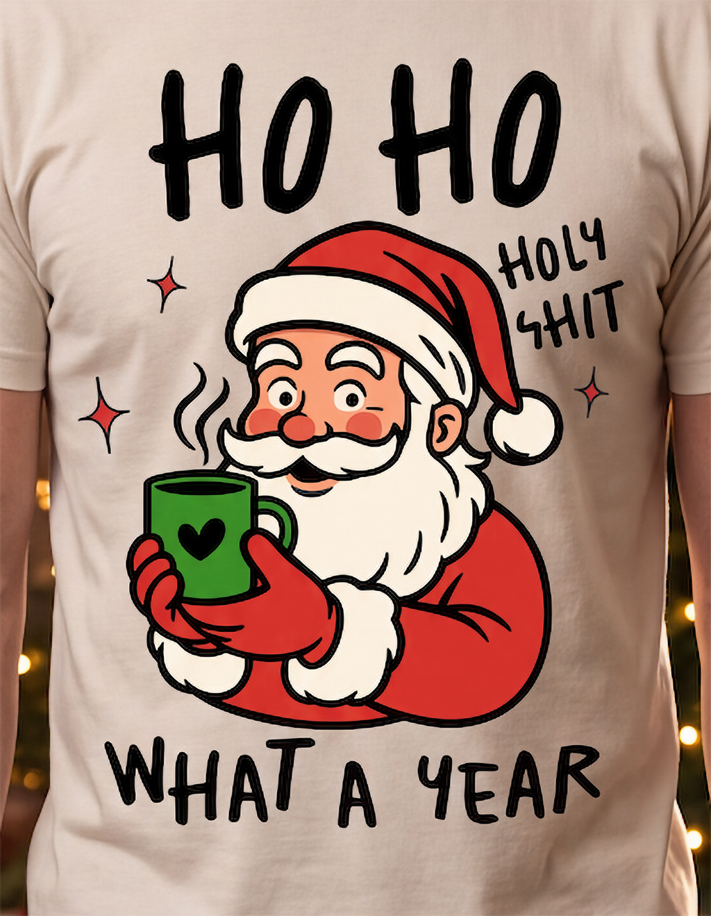 Close-up of Ho Ho Holy Shit What a Year Christmas Santa graphic printed on sand shirt.