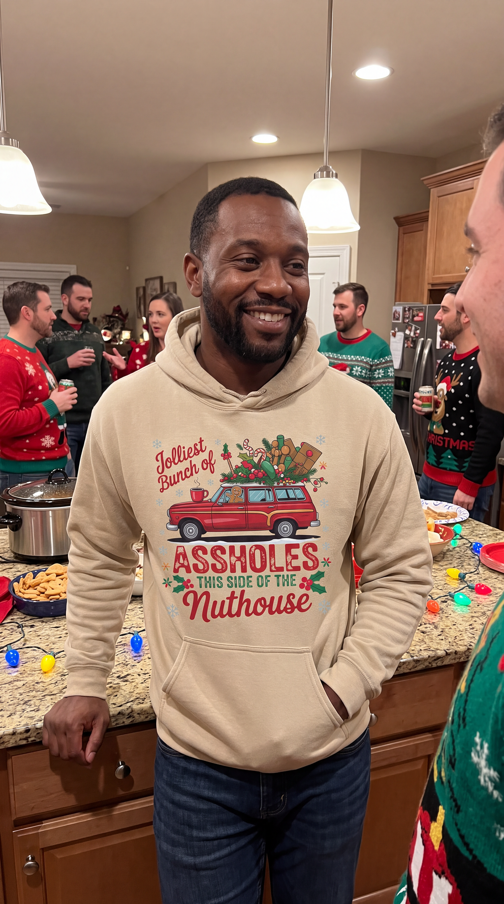 Man wearing sand funny family Christmas hoodie with Jolliest Bunch design