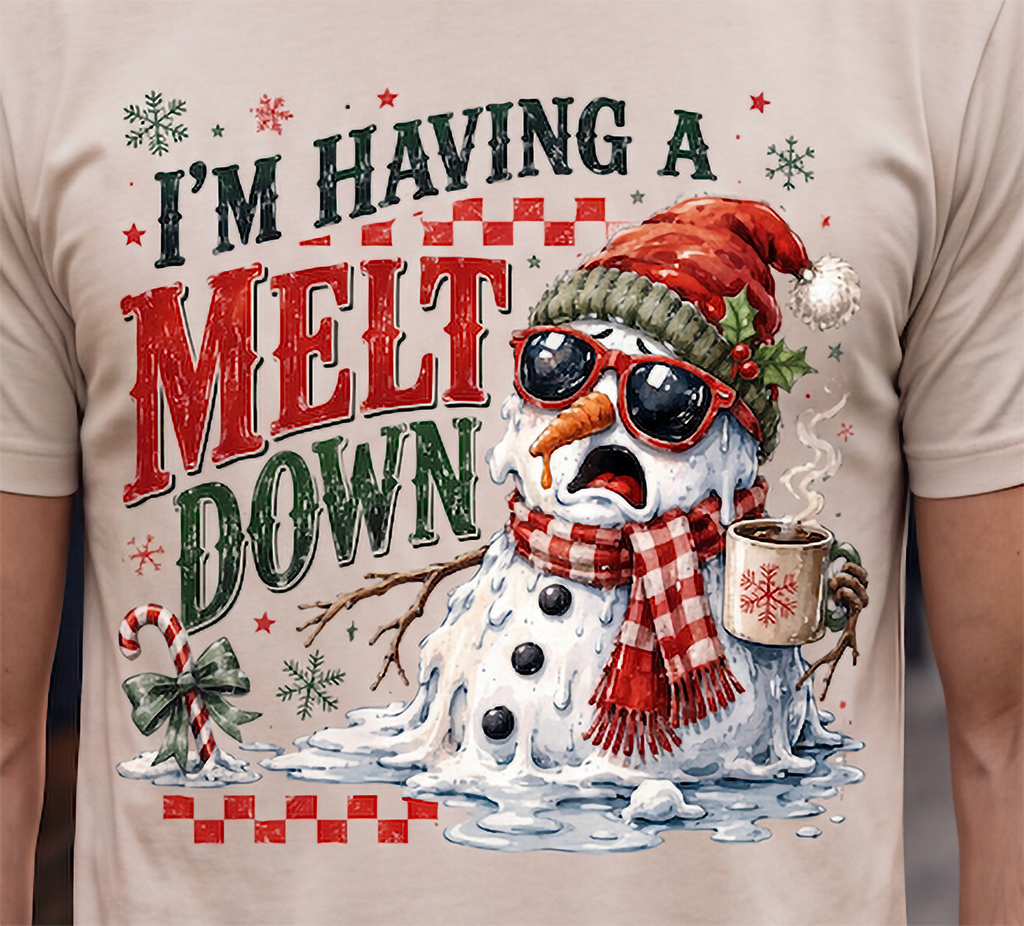Close-up of sand I’m Having a Meltdown Christmas shirt featuring funny snowman holiday design
