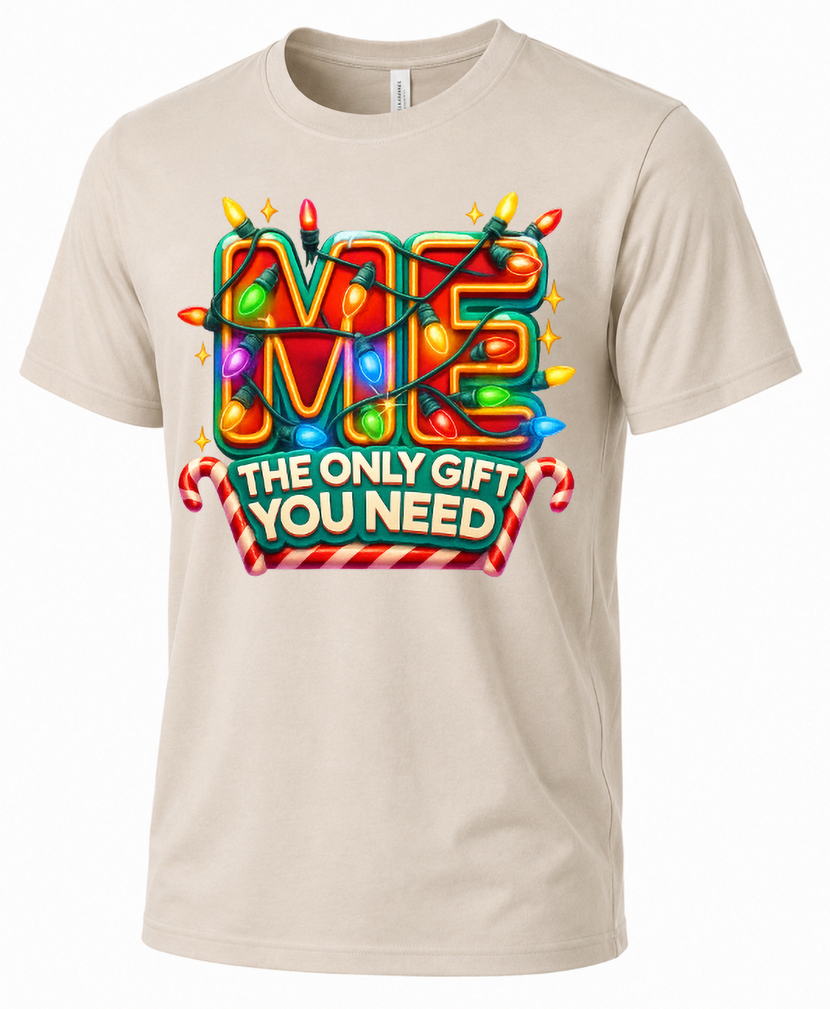 Sand Shirt Mockup: Sand-colored unisex Christmas t-shirt featuring colorful Me The Only Gift You Need lettering with holiday lights.