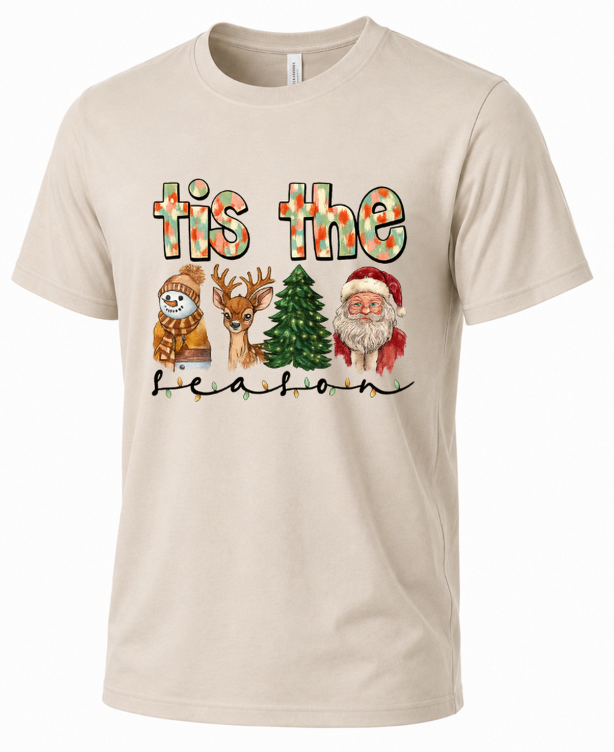 Sand-colored unisex Tis the Season Christmas t-shirt featuring watercolor Santa Claus, reindeer, snowman, Christmas tree, and festive holiday lettering.