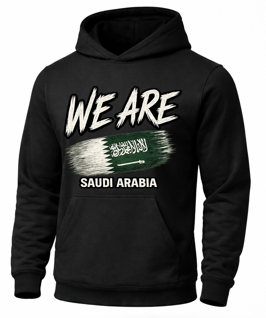 A black pullover hoodie featuring a graphic print on the front with the text 'WE ARE' in distressed white lettering above a stylized Saudi Arabia flag design, and 'SAUDI ARABIA' printed below in white.