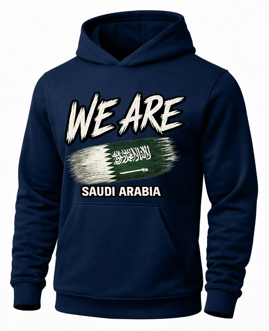 A navy blue pullover hoodie with a graphic print on the front. The design features the text 'WE ARE' in a distressed white font above a stylized, brush-stroke style depiction of the Saudi Arabian flag, with 'SAUDI ARABIA' printed in white below.