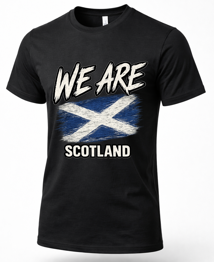 A black short-sleeve crewneck t-shirt featuring a distressed graphic print of the Scottish flag with the text 'WE ARE SCOTLAND' in white.