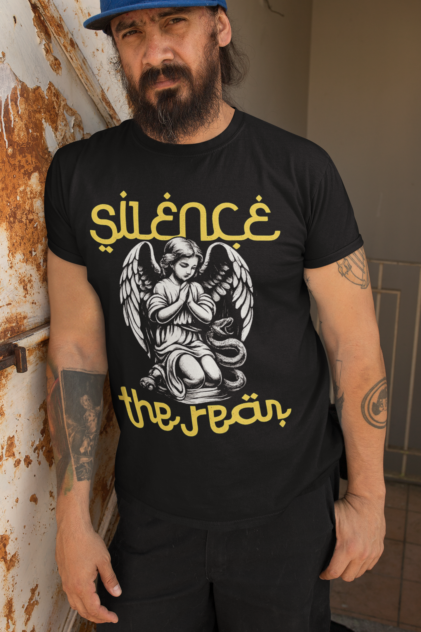 Man wearing Silence the Lambs dark humor graphic t-shirt with gothic angel illustration streetwear design