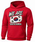 A red pullover hoodie featuring a graphic print of the South Korean flag with the text 'WE ARE SOUTH KOREA' in white, black, and blue.