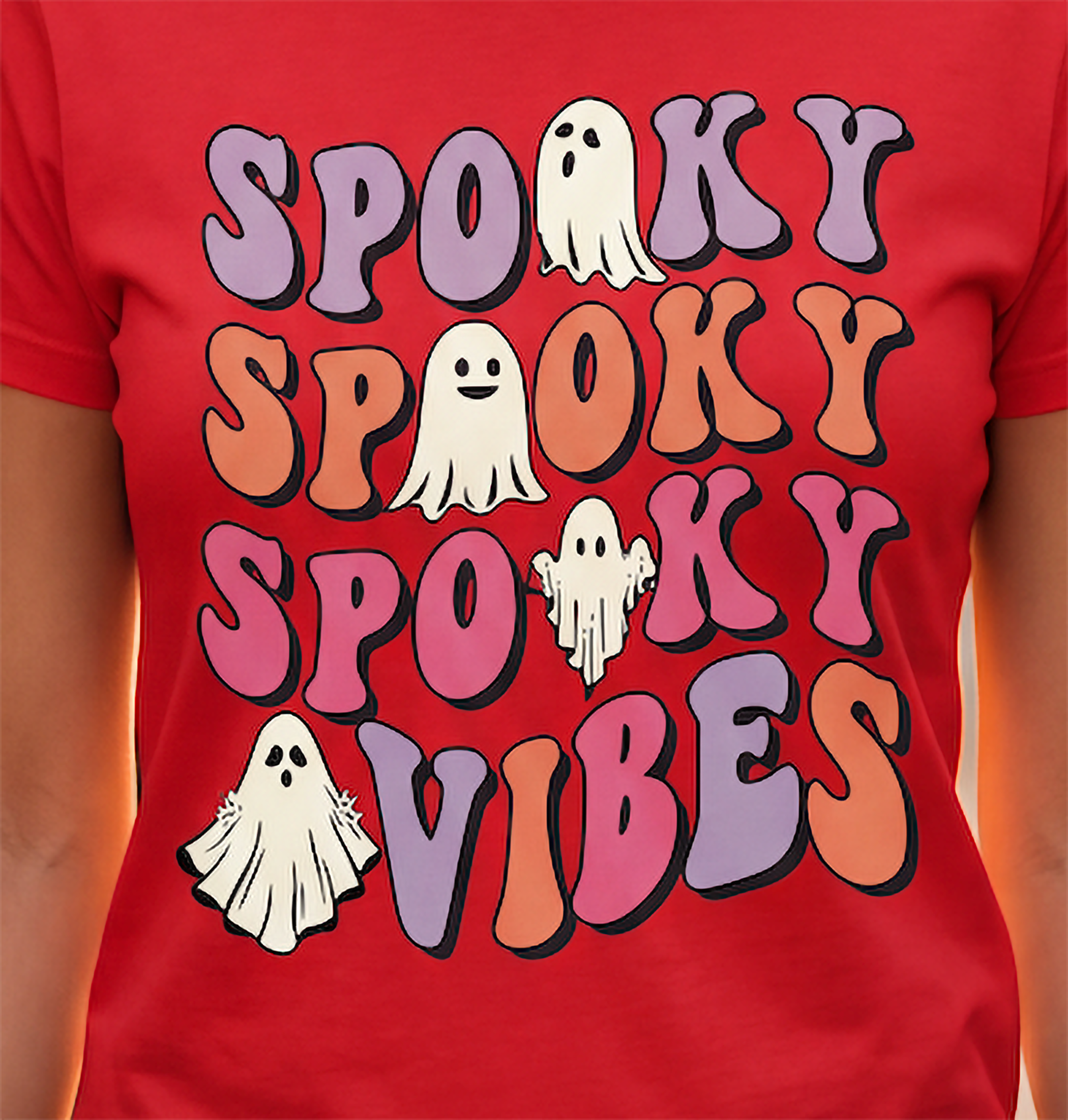 Close-up of colorful Spooky Vibes Halloween ghost graphic printed on red T-shirt