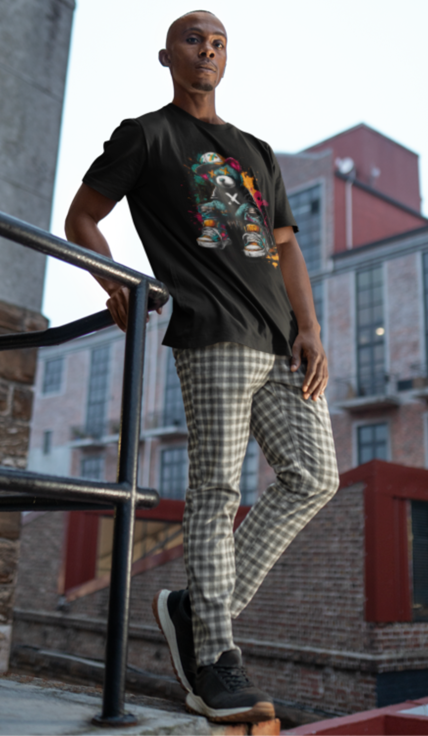 Model wearing black graffiti teddy bear streetwear graphic t-shirt urban hip hop fashion