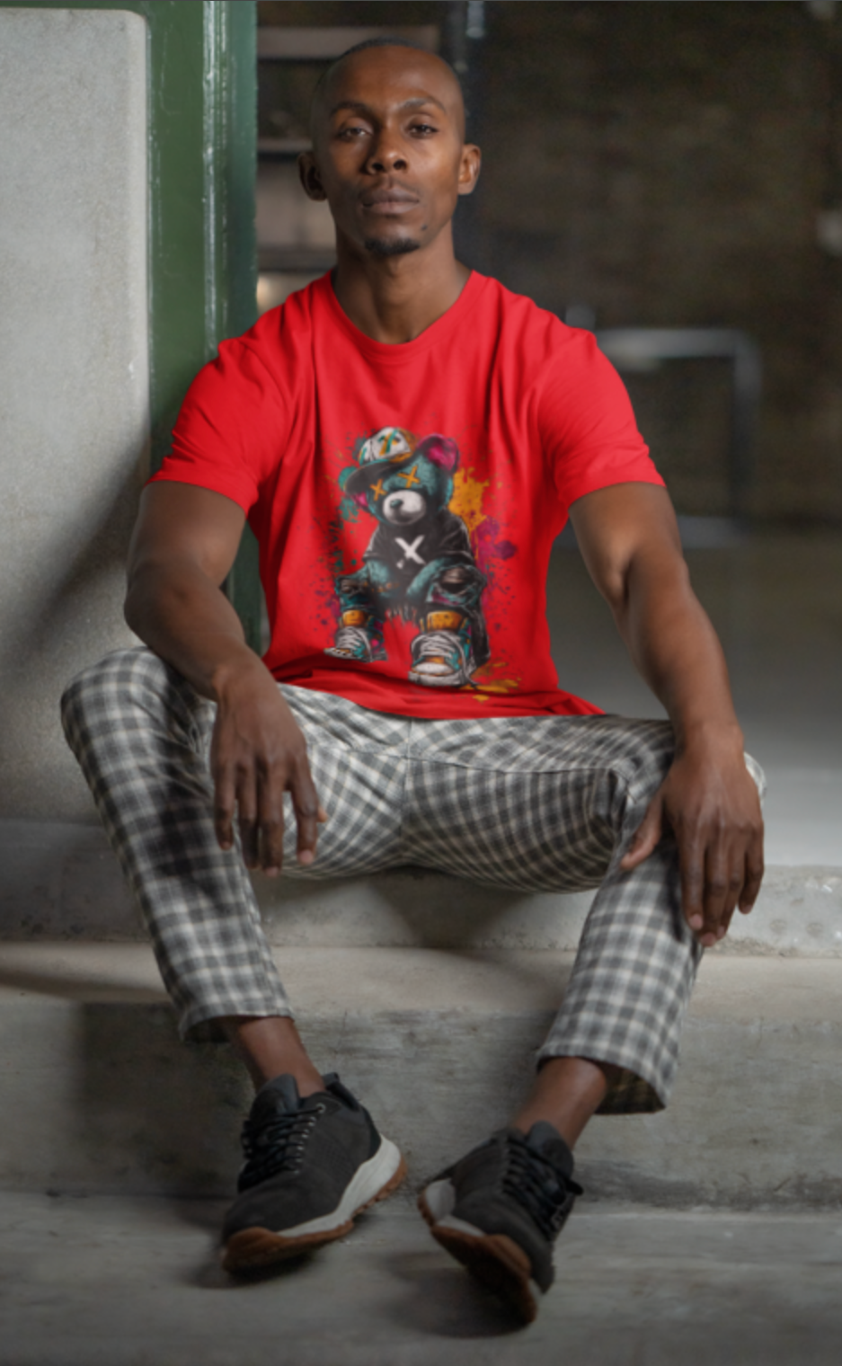 Man wearing red graffiti teddy bear streetwear graphic tee urban hip hop fashion