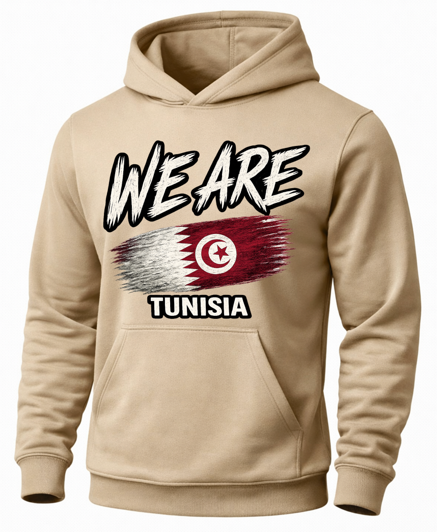 A beige pullover hoodie featuring a graphic print on the front with the text 'WE ARE' in a distressed white font, a stylized Tunisian flag, and 'TUNISIA' below it.