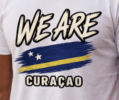 White short-sleeve t-shirt featuring a graphic print with the text 'WE ARE' above a stylized flag design and 'CURAÇAO' below, shown on a person wearing it.