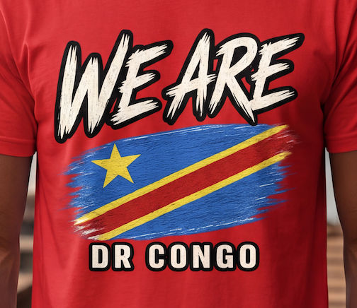 A close-up of a red short-sleeve t-shirt featuring a graphic print of the Democratic Republic of Congo flag with the text 'WE ARE DR CONGO' in bold white letters with black outlines.