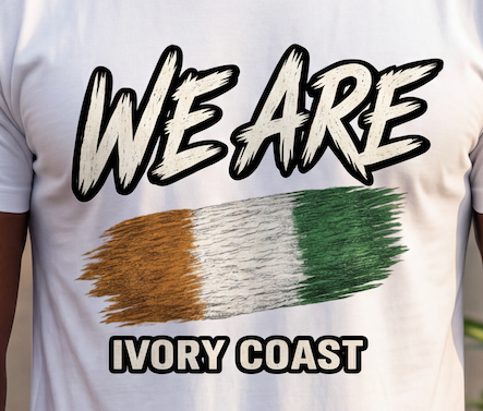 A close-up of a white graphic t-shirt worn by a person, featuring the text 'WE ARE' in a distressed black-and-white font above a textured tricolor design in gold, white, and green, with 'IVORY COAST' printed below.