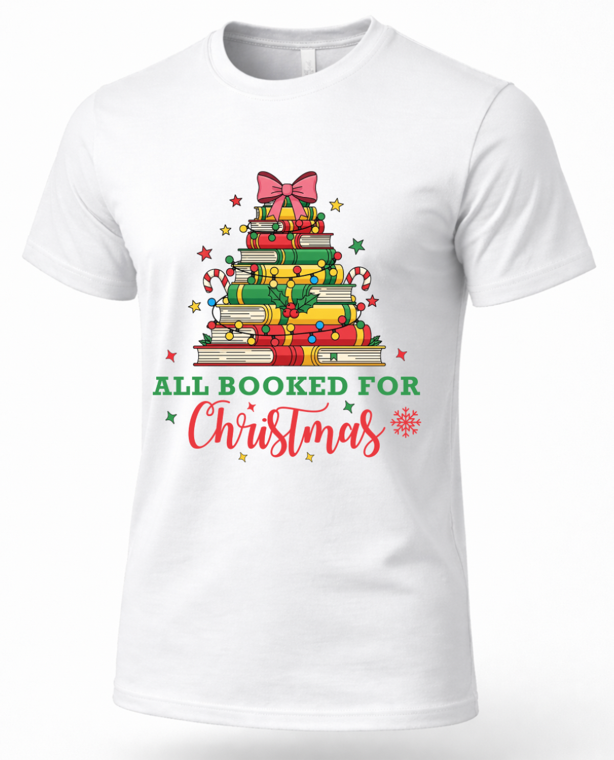 White All Booked for Christmas graphic tee featuring a Christmas tree made from colorful stacked books.