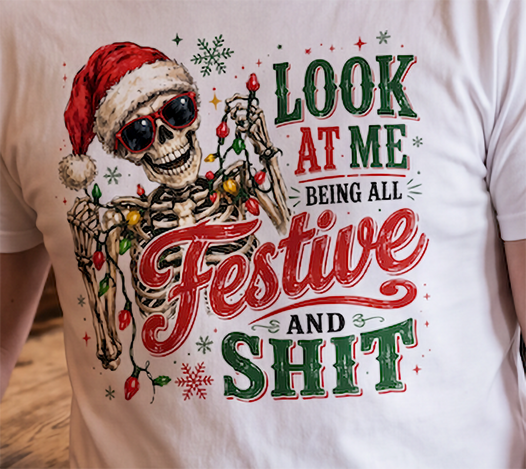 White graphic close-up: Detailed close-up of festive skeleton Santa Christmas shirt design on black fabric.