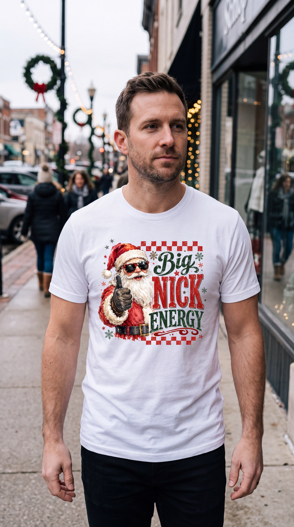 Model wearing white Big Nick Energy funny Christmas graphic tee