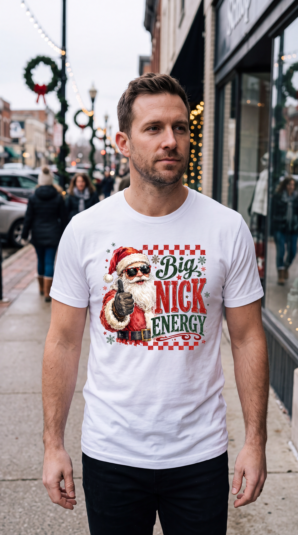 Model wearing white Big Nick Energy funny Christmas graphic tee