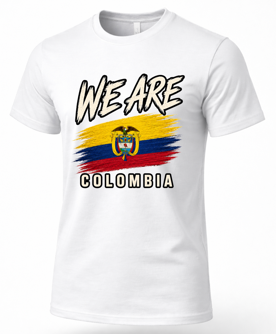 A white short-sleeve crewneck t-shirt featuring a graphic print on the front with the text 'WE ARE' above a stylized Ecuador-Colombia flag design and 'COLOMBIA' below.