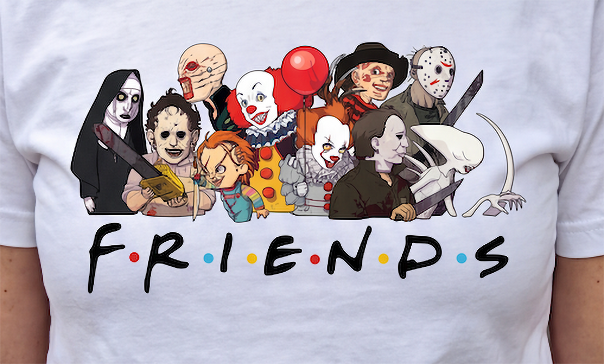 Close-up of white Horror Friends Halloween shirt with scary movie characters