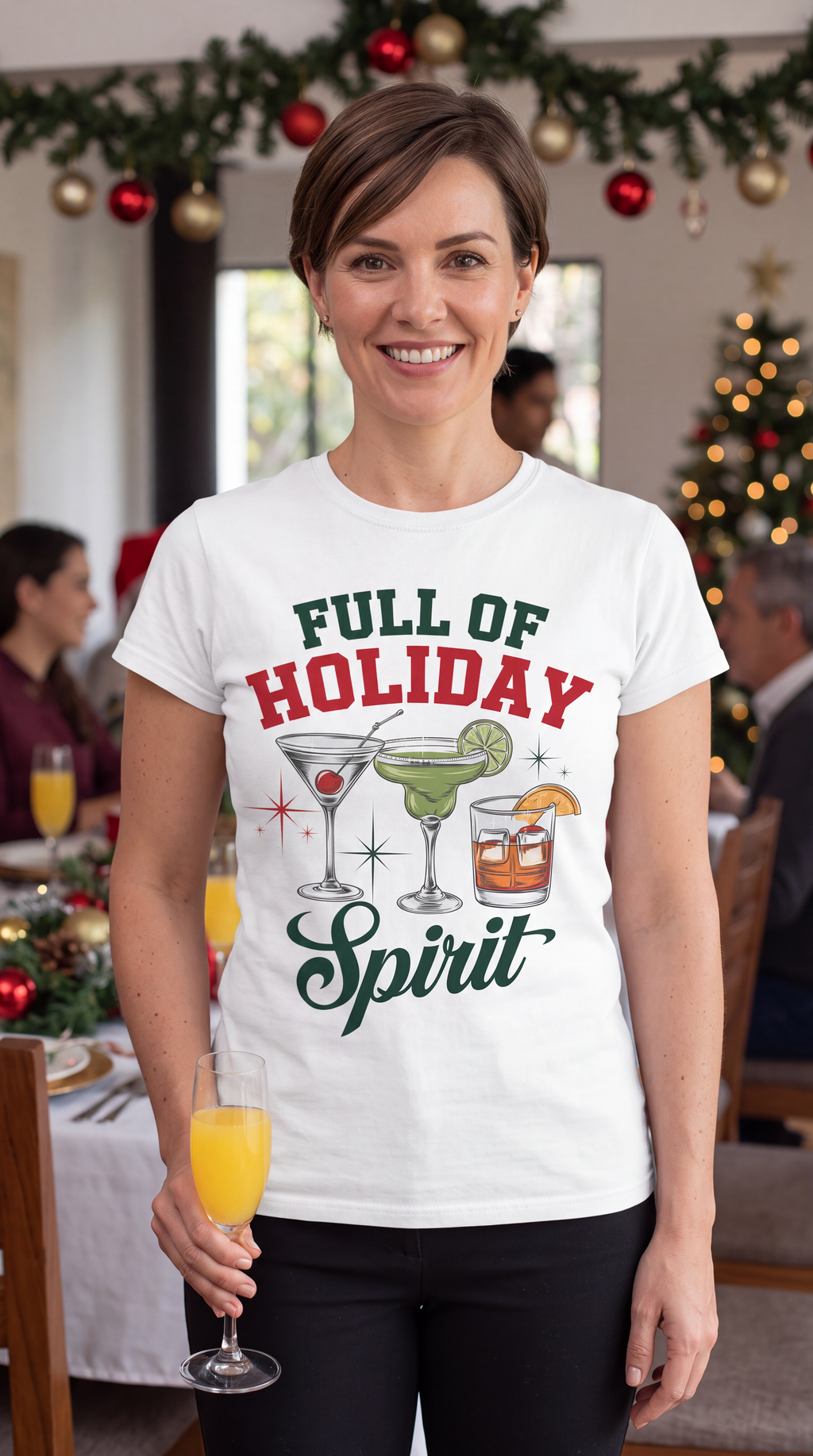 Woman wearing white Full of Holiday Spirit Christmas cocktail shirt in a festive holiday setting.