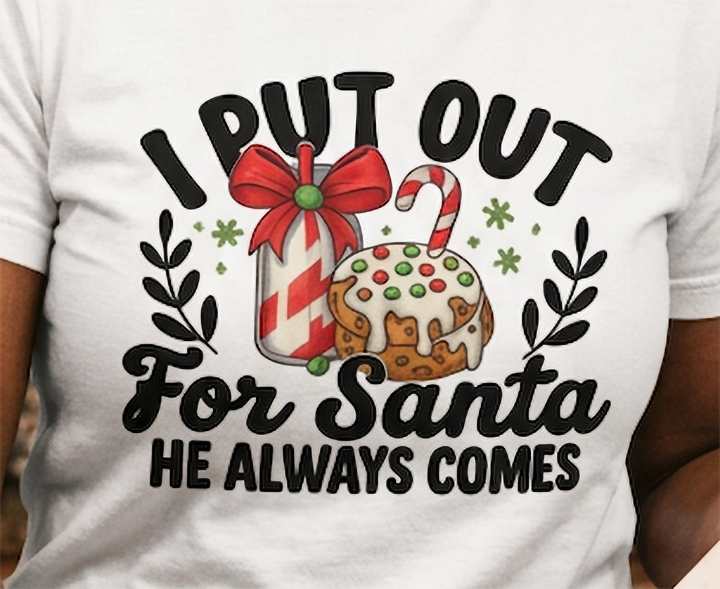 Close-up of I Put Out for Santa He Always Comes design on white Christmas shirt