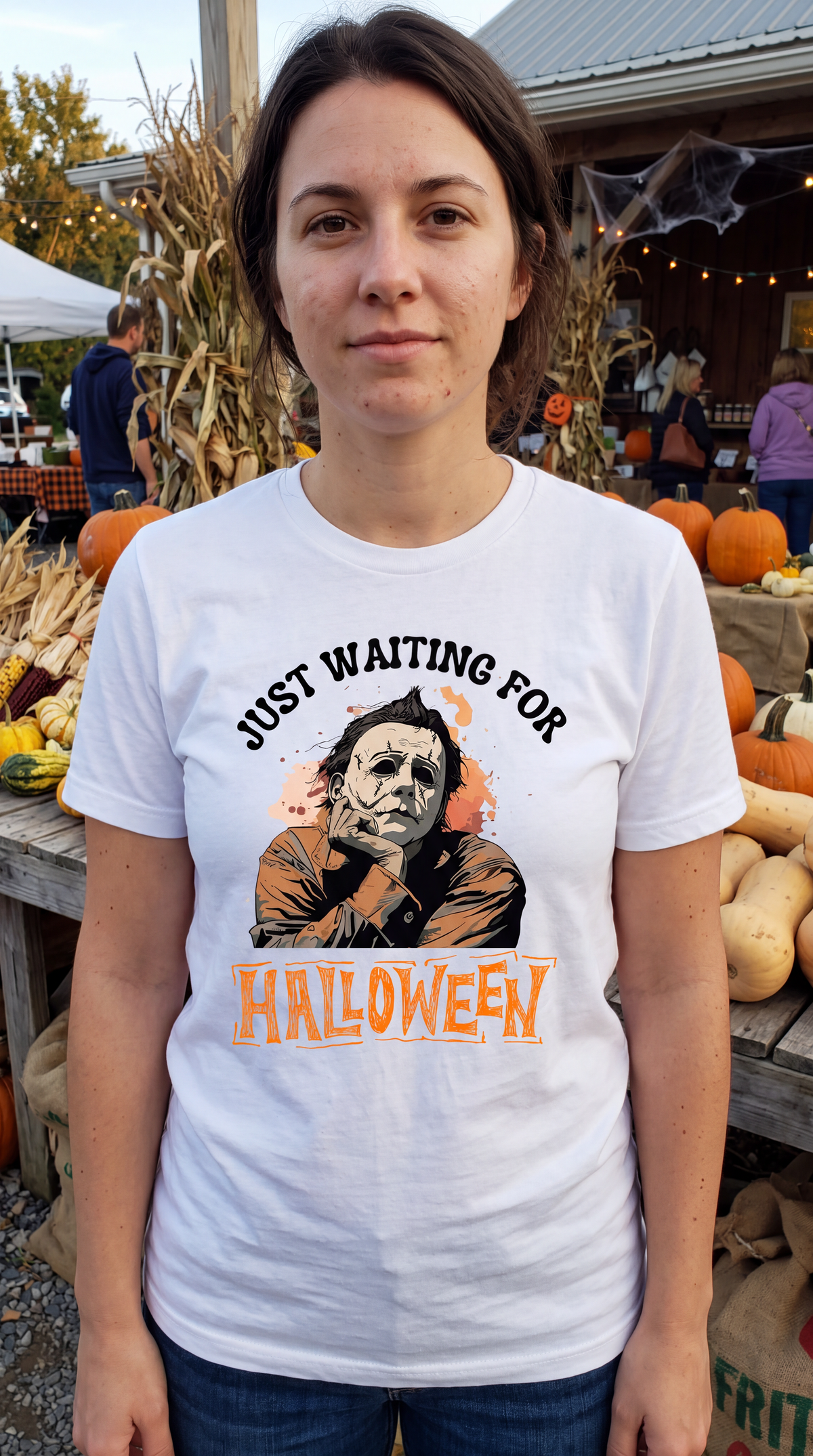 Woman wearing white Michael Myers Just Waiting for Halloween shirt